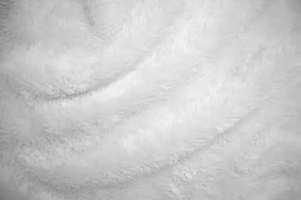 White clean wool texture background. light natural sheep wool. white seamless cotton. texture of fluffy fur for designers. close-up fragment white wool carpet. goat hair