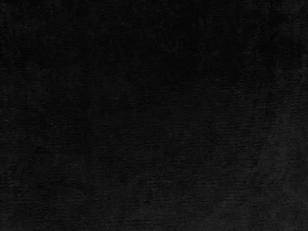 背景として使用される黒いベルベットの生地の質 柔らかく滑らかな織物材料の空の黒い生地の背景 テキストのためのスペースがあります — ストック写真