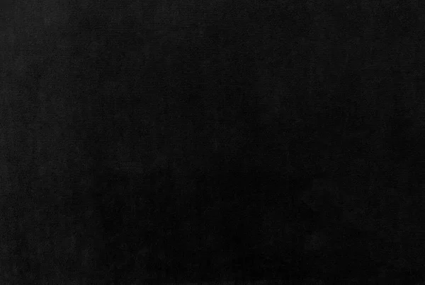 背景として使用される黒いベルベットの生地の質 柔らかく滑らかな織物材料の空の黒い生地の背景 テキストのためのスペースがあります — ストック写真