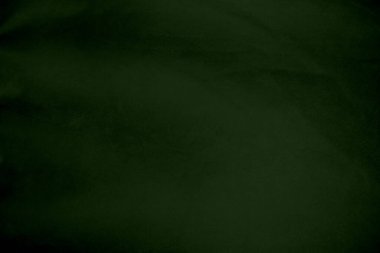 Açık yeşil kadife kumaş dokusu gradyanı arka plan olarak kullanılır. Yumuşak ve pürüzsüz tekstil malzemelerinin zümrüt renkli kumaş arka planı. Ezilmiş kadife. İpek için lüks zümrüt rengi..