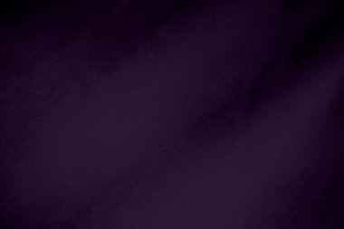 Dark purple velvet fabric texture used as background. Violet color panne fabric background of soft and smooth textile material. crushed velvet .luxury magenta tone for silk.	