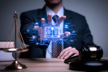 Lawyer's hand concept Justice with Judge gavel, Businessman in suit or Hiring lawyers in the digital system. Legal law, prosecution, legal adviser, lawsuit, detective, investigation,legal consultant.	