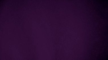 Dark purple velvet fabric texture used as background. Violet color panne fabric background of soft and smooth textile material. crushed velvet .luxury magenta tone for silk.	