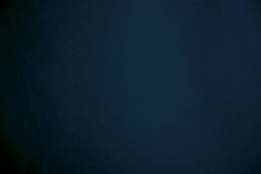 blue velvet  soft rough textile material background texture close up,poker table,tennis ball,table cloth. Empty navy blue fabric denim background.	