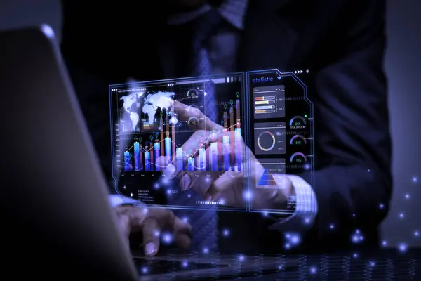 Businessman working with business analytics and data anagement system on computer, online total processing and metrics connected to database. corporate strategy for finance, operations, sales hologram