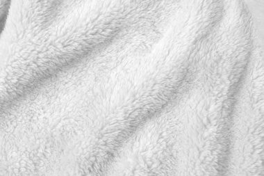 White clean wool texture background. light natural sheep wool. white seamless cotton. texture of fluffy fur for designers. close-up fragment white wool carpet.	