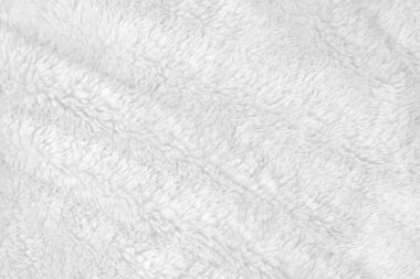 White clean wool texture background. light natural sheep wool. white seamless cotton. texture of fluffy fur for designers. close-up fragment white wool carpet.	