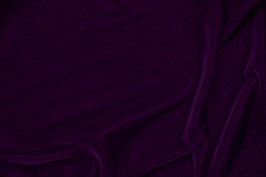 Purple velvet fabric texture used as background. Empty purple fabric background of soft and smooth textile material. There is space for text..	