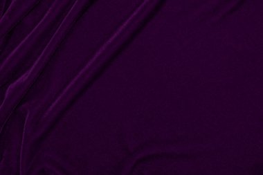 Purple velvet fabric texture used as background. Empty purple fabric background of soft and smooth textile material. There is space for text..	