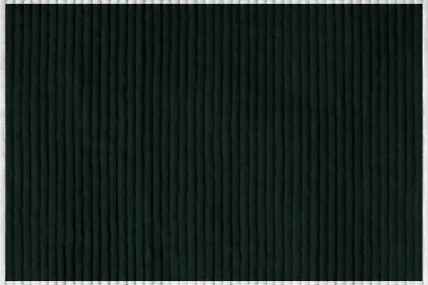 dark green corduroy fabric texture used as background. Emerald color panne fabric background of soft and smooth textile material. cloth, velvet, grooves luxury green tone for silk.