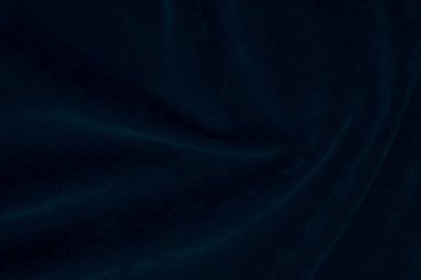 Arka plan olarak kullanılan mavi ipek kumaş dokusu. Yumuşak ve pürüzsüz tekstil malzemelerinden yapılmış kot panne kumaş arka planı. Ezilmiş kadife. Kadife için lüks donanma..