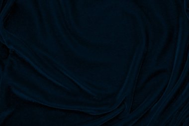 light blue corduroy fabric texture used as background. color blue fabric background of soft and smooth textile material. cloth, velvet, grooves luxury navy tone for silk.	