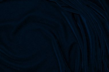 light blue corduroy fabric texture used as background. color blue fabric background of soft and smooth textile material. cloth, velvet, grooves luxury navy tone for silk.	