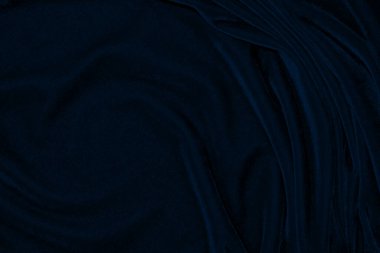 dark blue corduroy fabric texture used as background. Emerald color panne fabric background of soft and smooth textile material. cloth, velvet, grooves luxury navy tone for silk.	
