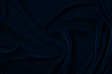 dark blue corduroy fabric texture used as background. Emerald color panne fabric background of soft and smooth textile material. cloth, velvet, grooves luxury navy tone for silk.	