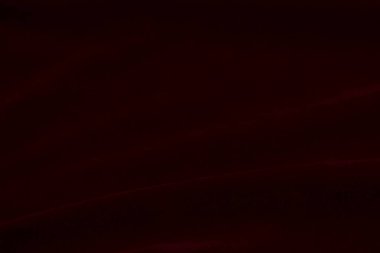 Red silk fabric texture used as background. red panne fabric background of soft and smooth textile material. crushed velvet .luxury scarlet for velvet.	