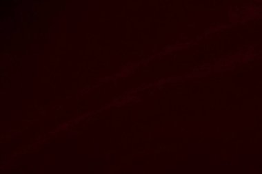 Red silk fabric texture used as background. red panne fabric background of soft and smooth textile material. crushed velvet .luxury scarlet for velvet.	