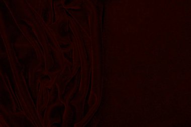 Red silk fabric velvet texture used as background. red panne fabric background of soft and smooth textile material. crushed velvet .luxury scarlet for design.	
