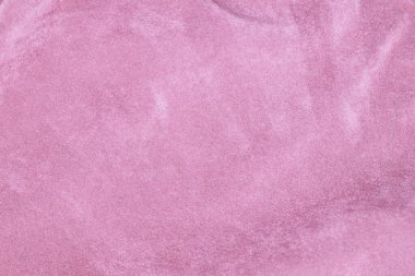 Arka plan olarak kullanılan açık pembe kadife kumaş dokusu. Yumuşak ve pürüzsüz tekstil malzemelerinin ipek rengi Sakura kumaş arka planı. Ezilmiş kadife. Lüks kiraz çiçeği. İpek için hafif ton..