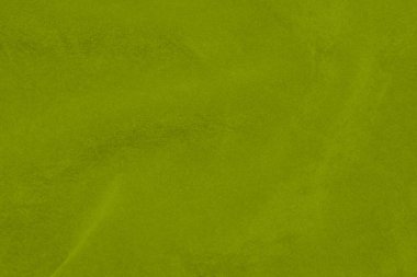 Kireç rengi yeşil kadife kumaş dokusu arka plan olarak kullanılır. Yumuşak ve pürüzsüz tekstil malzemelerinin zümrüt renkli kumaş arka planı. Ezilmiş kadife. İpek için lüks zümrüt rengi..