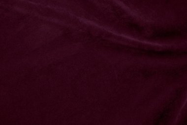 Arka plan olarak kullanılan koyu pembe kadife kumaş dokusu. Yumuşak ve pürüzsüz tekstil malzemelerinin ipek rengi Sakura kumaş arka planı. Ezilmiş kadife. Lüks kiraz çiçeği. İpek için hafif ton..