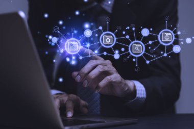 Businessman writes signing contract, designs, draws, or sketches projects through a tablet on the office desk. Hand concept stamp of approval on a public notarization certificate document electronic.	