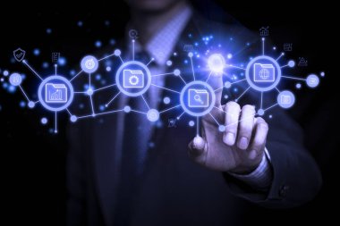 Businessman writes signing contract, designs, draws, or sketches projects through a tablet on the office desk. Hand concept stamp of approval on a public notarization certificate document electronic.	