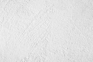 Beyaz taş dokunun yüzeyi pürüzlü, gri-beyaz tonda, boya duvarı. Duvar kağıdı veya arkaplan resmi için bunu kullanın. Beton duvar. Bağbozumu için pürüzsüz doku beyaz