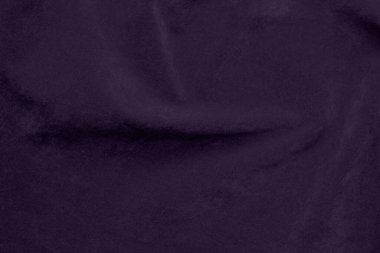 Arka plan olarak kullanılan yumuşak mor kadife kumaş dokusu. Yumuşak ve pürüzsüz tekstil malzemelerinin lavanta rengi kumaş arka planı. Ezilmiş kadife. Lüks mor ipek için yumuşak ton...