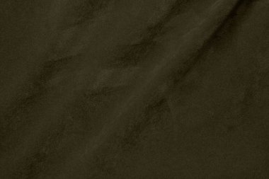 Arka plan olarak zeytin yeşili kadife kumaş dokusu kullanılır. Yumuşak ve pürüzsüz tekstil malzemelerinden açık yeşil kumaş arkaplan. Metin için boşluk var..