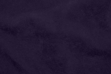 Arka plan olarak kullanılan yumuşak mor kadife kumaş dokusu. Yumuşak ve pürüzsüz tekstil malzemelerinin lavanta rengi kumaş arka planı. Ezilmiş kadife. Lüks mor ipek için yumuşak ton...