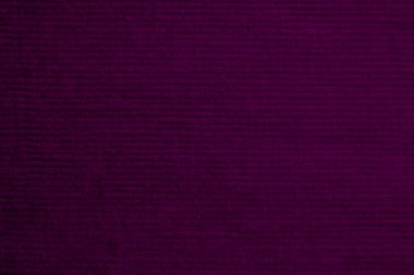 Purple corduroy fabric texture used as background. clean fabric background of soft and smooth textile material. cloth, velvet, .luxury violet tone for silk..	