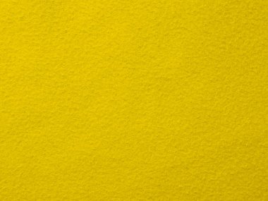 Kalıplı sarı bir arka plan. Sarı renk parlak ve neşeli, ve desen görüntüye derinlik ve ilgi katıyor.