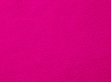 Ortasında beyaz nokta olan pembe bir arka plan. Arka plan çok parlak ve nokta küçük.