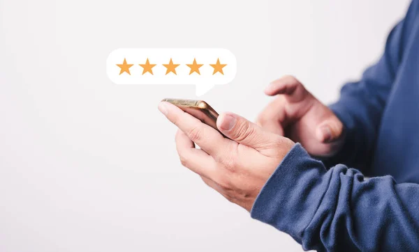 Customer Man Hand Press Smartphone Screen Golden Five Star Reviews — Stock Photo, Image