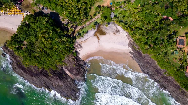 Aerial view of the beaches of Itacare, Bahia, Brazil. Small beaches with forest in the background and sea with waves.