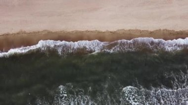 surf of the waves of the black sea. Wild beach.