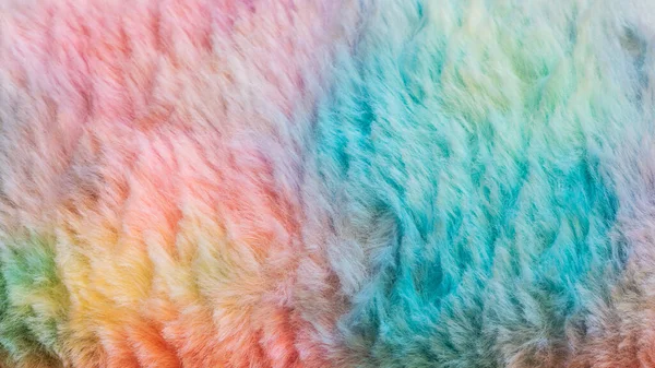 Colorful soft artificial textile material resembling animal fur coat