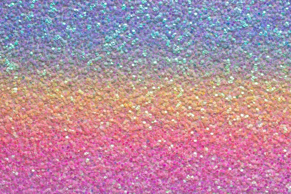 Rainbow glitter gradient. Holographic effect. Full frame background texture