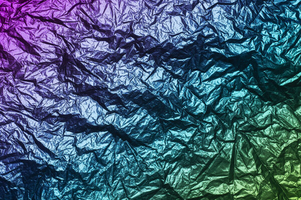 Shiny metallic foil texture with color gradient