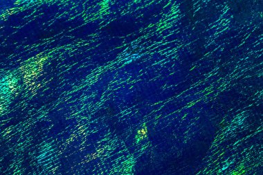 Yeşil-mavi tonlarda buruşmuş metal folyo yaprak dokusu