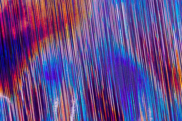 Falling Colorful Streaks. Iridescent Dynamic Lines. Color spectrum. Abstract Background