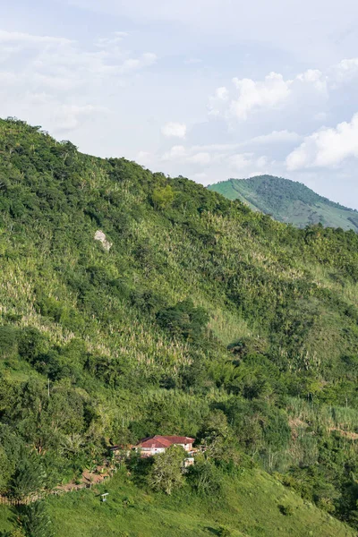 stock image house of a peasant family in a traditional colombian farm, in a rural area of the municipality of Quinchia-Risaralda, Colombia. colombian natural landscape, on a mountainside.