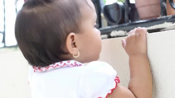 Close Beautiful Brunette Baby Girl Looking Curiosity Exploring Trying Look — Vídeo de Stock