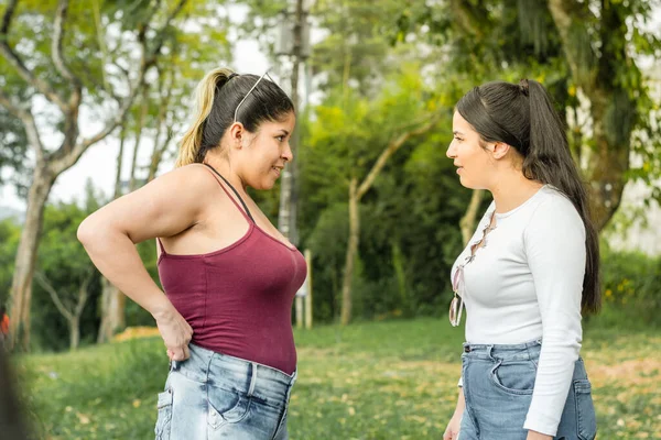 Girls Park Looking Each Other Talking While Taking Very Happy — Stock Photo, Image