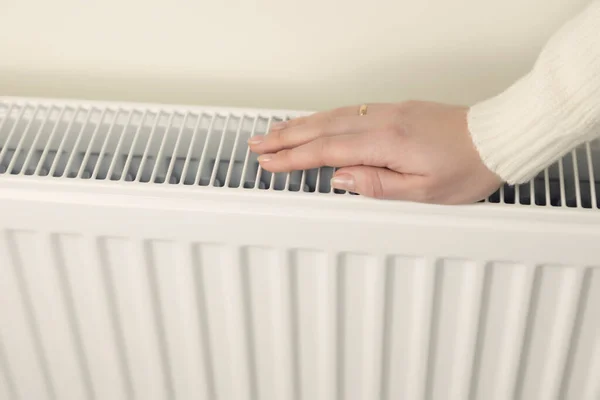 Concept Heating Season Womans Hand Tries Check Whether Heating Radiator — Stock Photo, Image