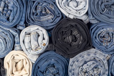 Rolls of jeans, denim texture. Texture of denim fabric