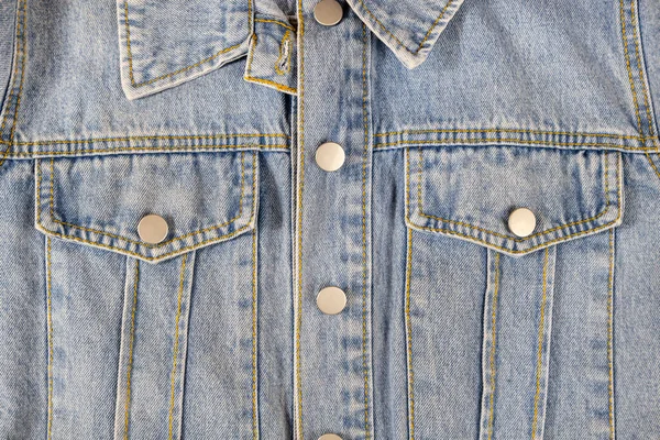 Denim jacket close-up. Blue jeans texture, design