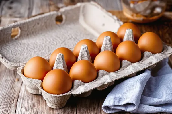 a carton of eggs with six dozen eggs in it