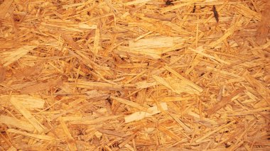              Arka plan, tahtaya sıkıştırılmış küçük ahşap talaşı, örgü.                  
